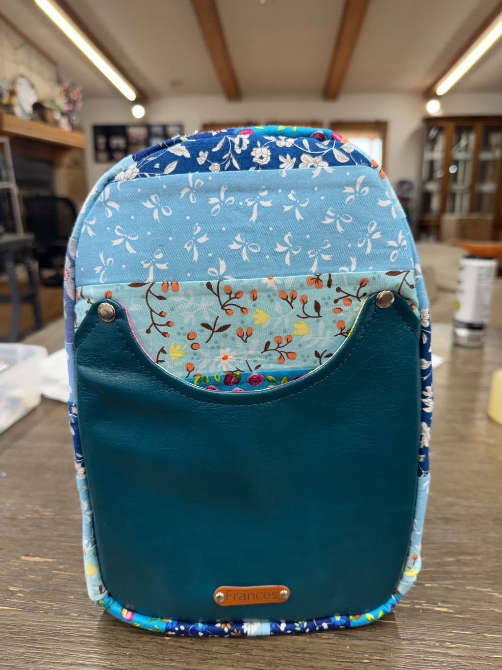 Blue quilted sling bag