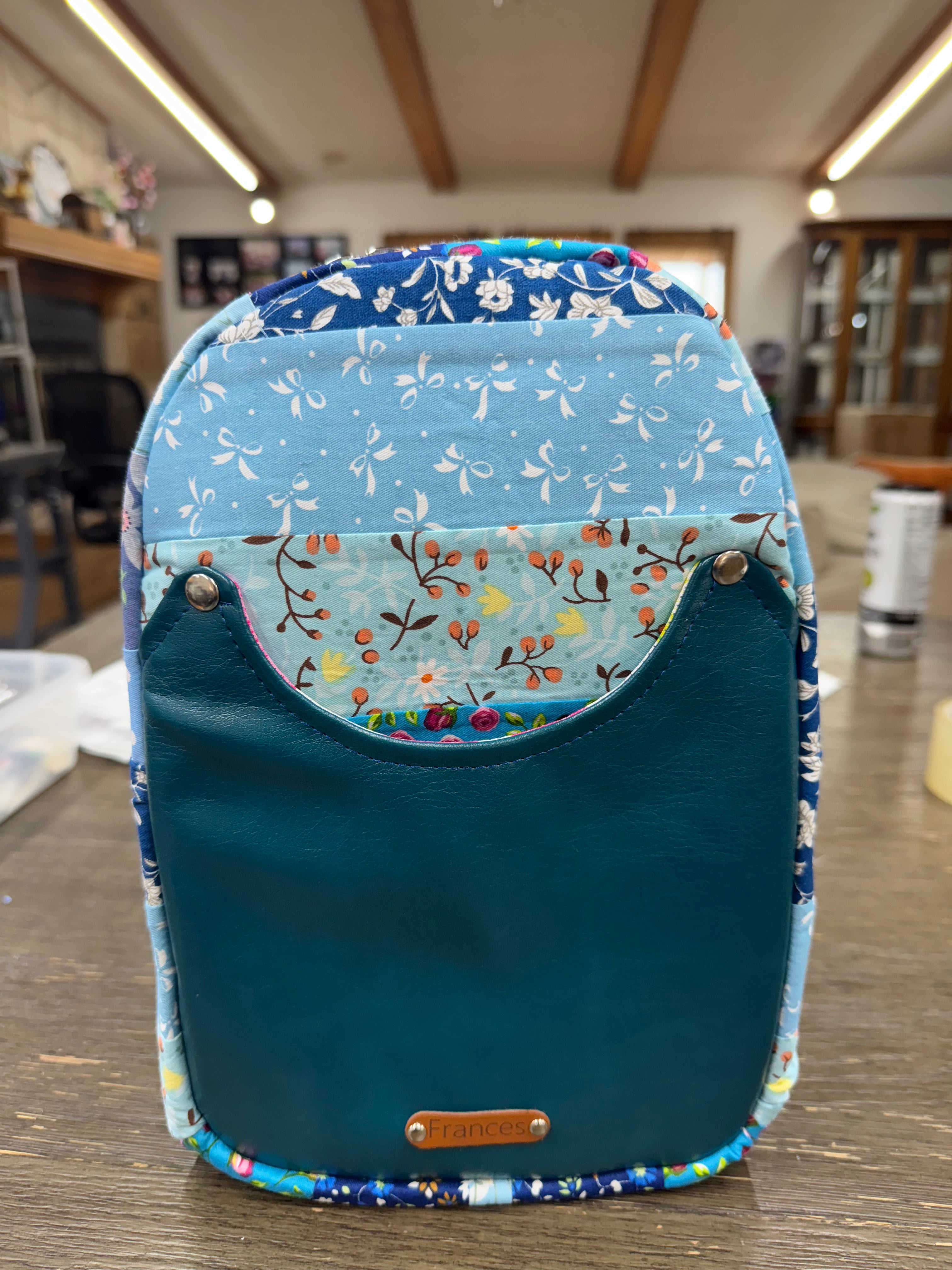 Blue quilted sling bag