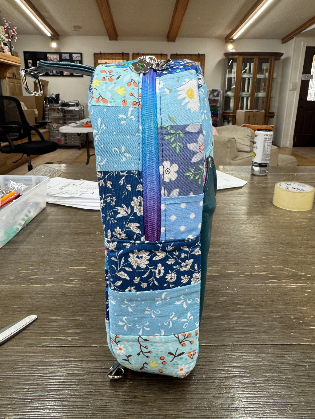 Blue quilted sling bag