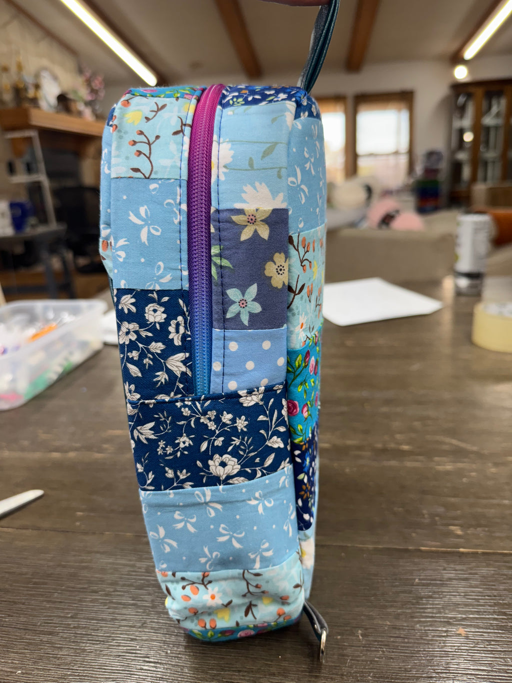 Blue quilted sling bag