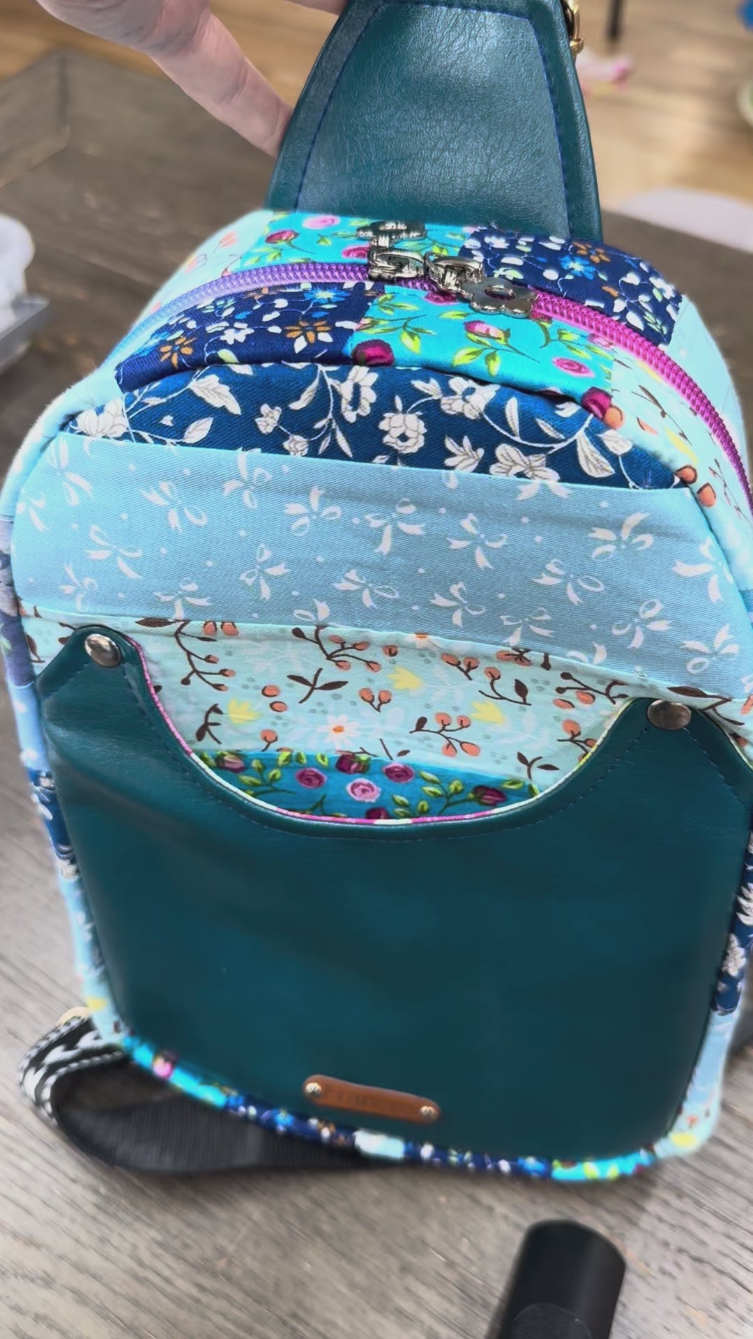 Blue quilted sling bag